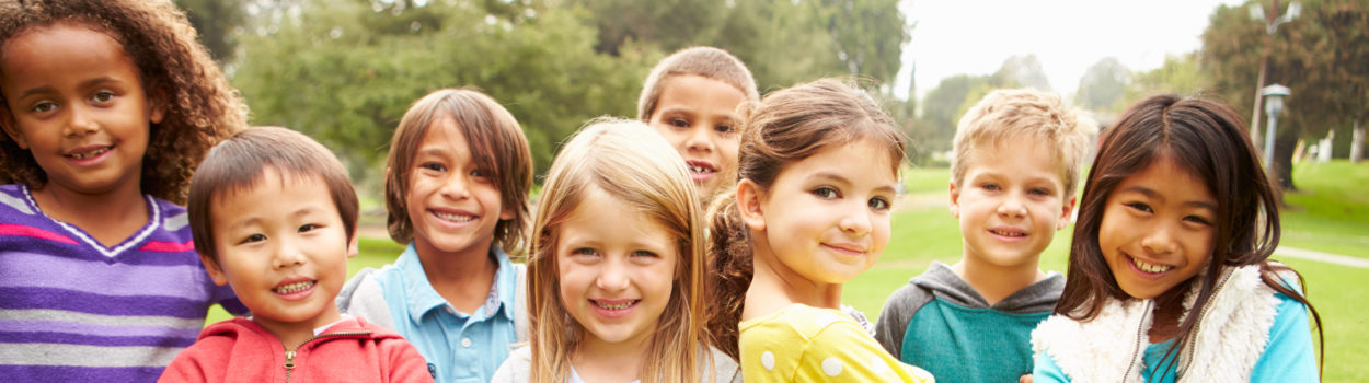 Group Of Young Children Hanging Out In Park Group Of Young Children Hanging Out In Park